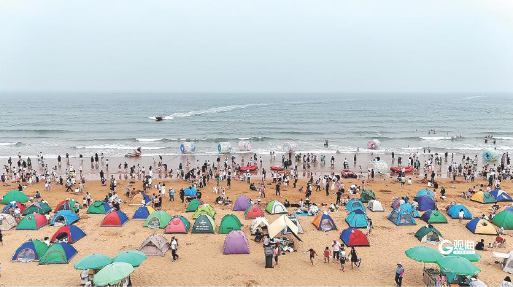 端午节假期青岛历史城区揽客忙，海水浴场人气旺